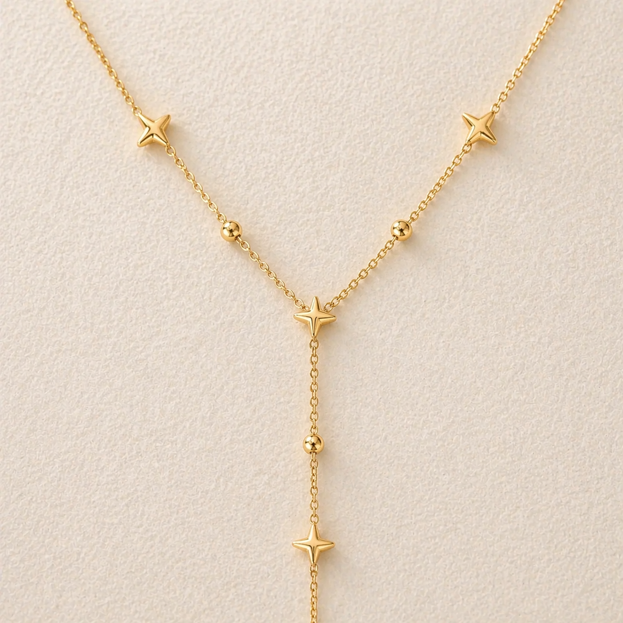 "Astra Flow" elegante Y Kette im Sternen Design